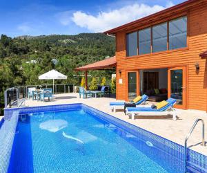 ⛰️ Tepe Evi | Kalkan İslamlar'da Deniz Manzaralı & Çift Jakuzili Balayı Villası