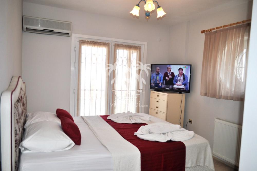 Ovacık kiralık villa klimalı çift kişilik konforlu yatak odası