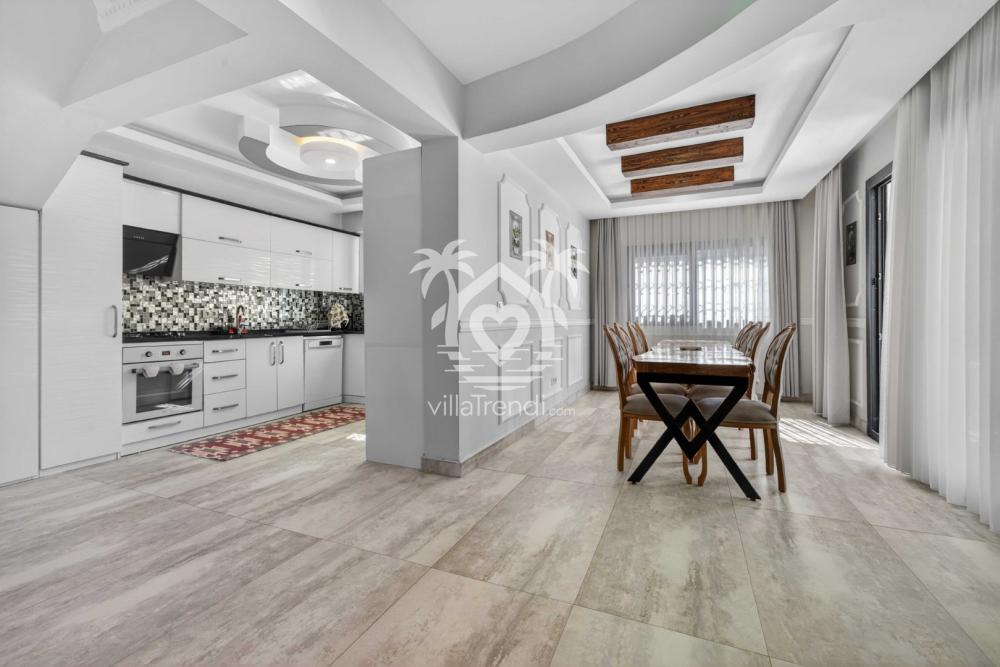 Ölüdeniz kiralık tatil villası Ovi şık tasarımlı salon ve yemek alanı.