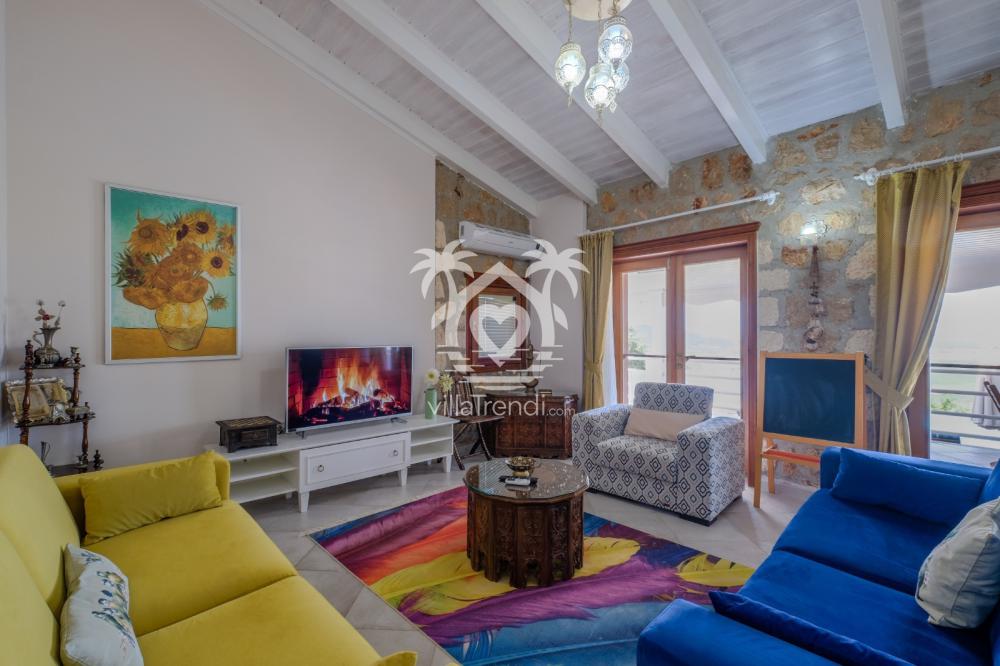 Villa Dr 1 modern Amerikan mutfak ve ferah dekorasyonlu deniz manzaralı salon detayları.