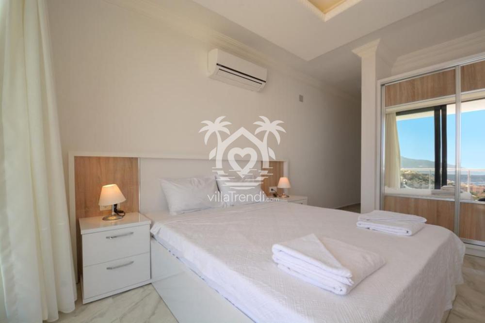 Villa Kaliza klimalı, çift kişilik konforlu yatak odası.