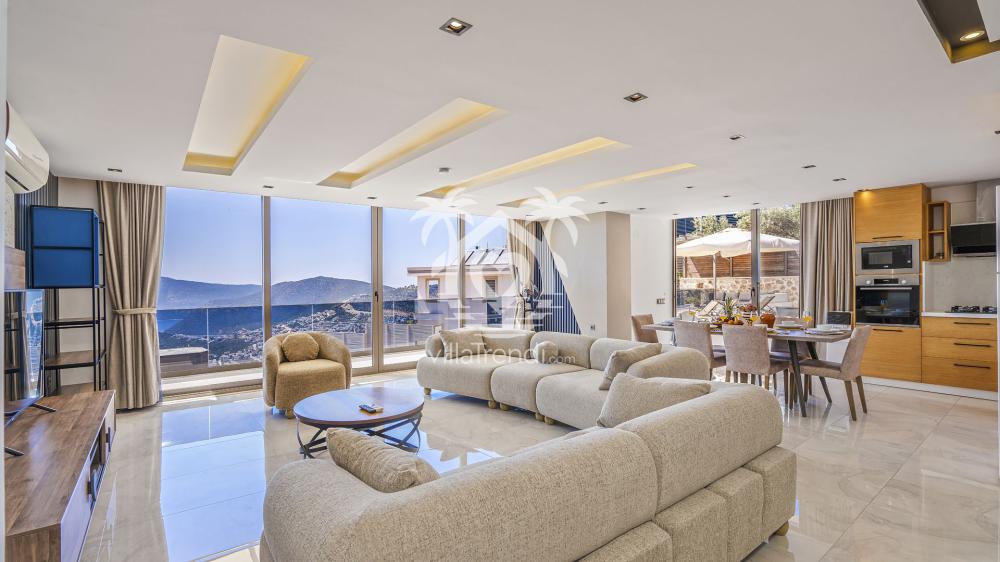Kalkan deniz manzaralı villa geniş ve konforlu salon oturma grubu.