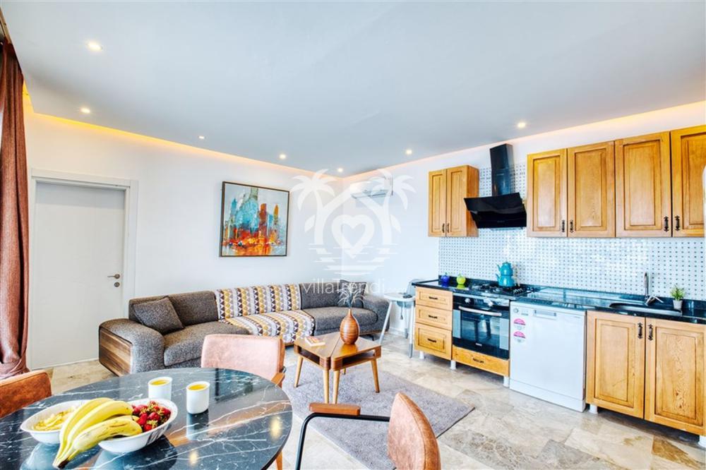 Kalkan Akbel kiralık villa Pitaya Vadi modern salon ve Amerikan mutfak tasarımı.