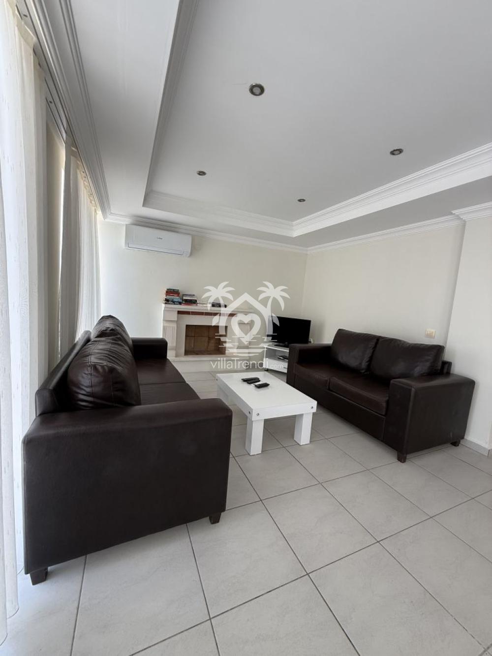 Şömineli ve klimalı konforlu salon oturma grubu Villa Bella Fethiye.