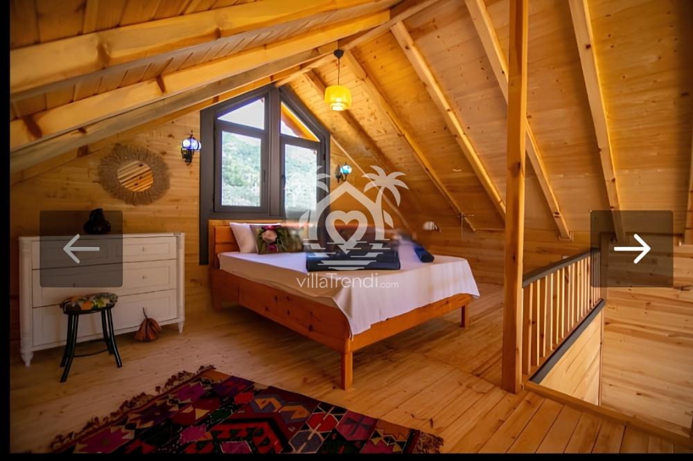 Villa Amor Göcek romantik loft mimarili çift kişilik yatak odası.