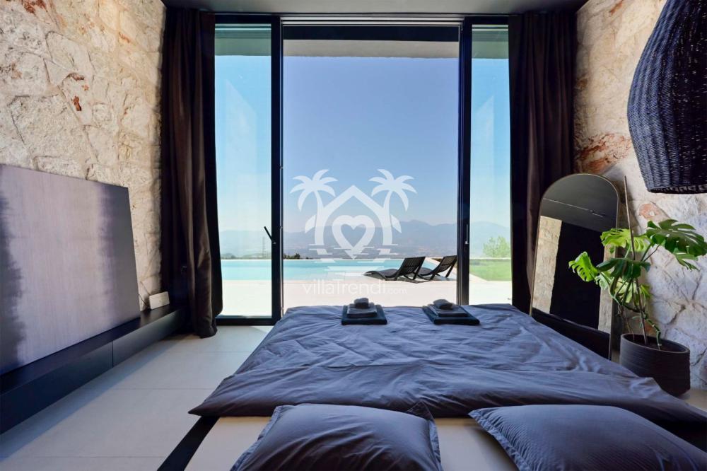 Fethiye hamamlı villa Cube yatak odası ve doğa manzarası.