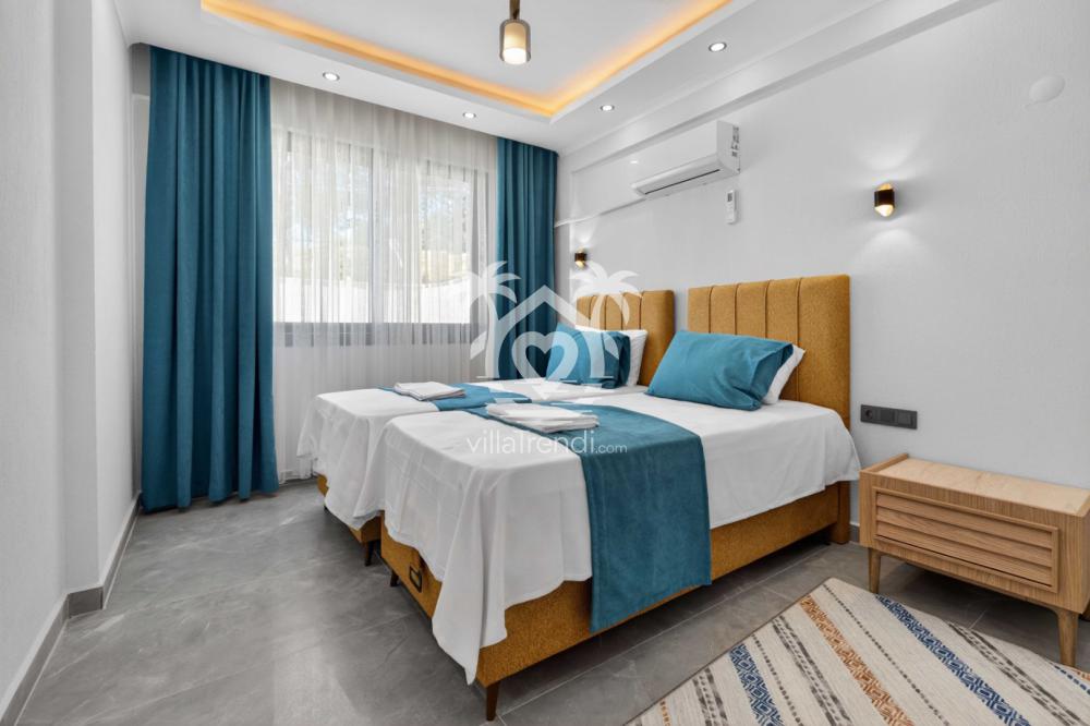 Seydikemer aile villası Doğa iki tek kişilik yataklı çocuk odası.
