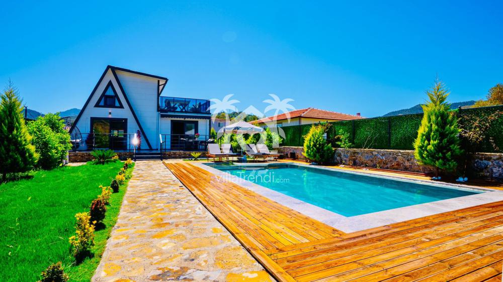 Villa Frame House Marmaris ısıtmalı özel havuzlu kiralık üçgen villa dış cephesi.