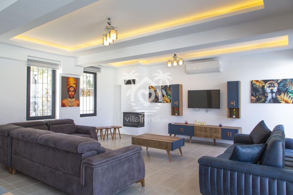 Villa Nes 1 ferah ve aydınlık lüks salon oturma grubu yerleşimi.