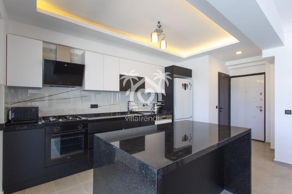 Villa Nes 1 modern ankastre donanımlı Amerikan mutfak tezgahı.