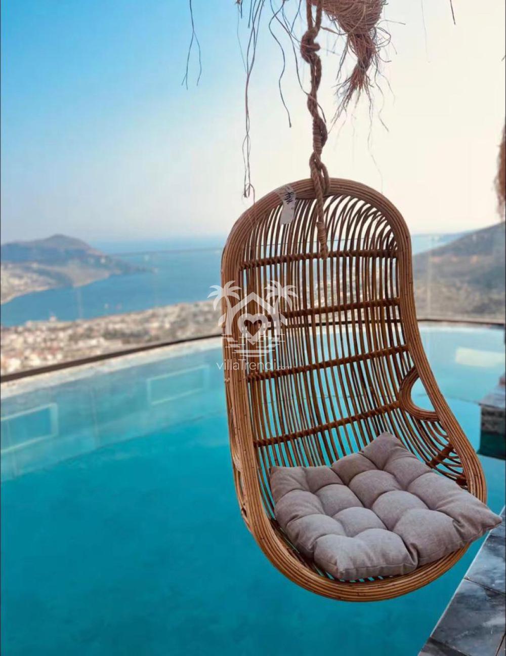 Kalkan deniz manzaralı kiralık villa Zeus havuz başı salıncak keyfi.