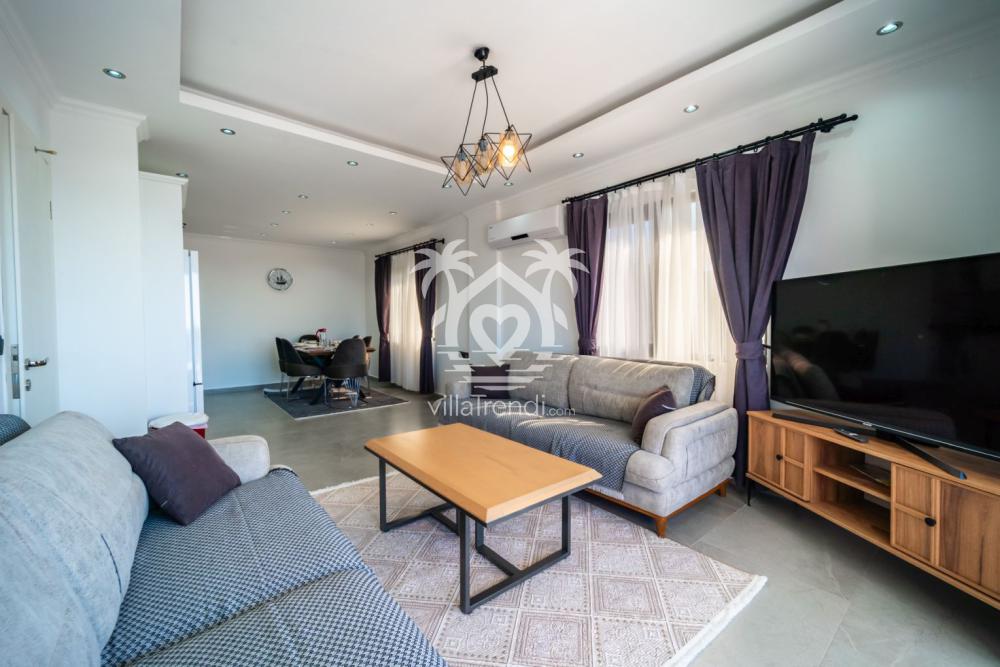 Kalkan Üzümlü lüks kiralık villa ferah salon oturma grubu.